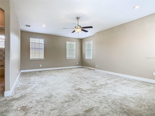 2209 Callaway Ct, Davenport, FL 33837 - carpeted spare room with a ceiling fan and recessed lighting