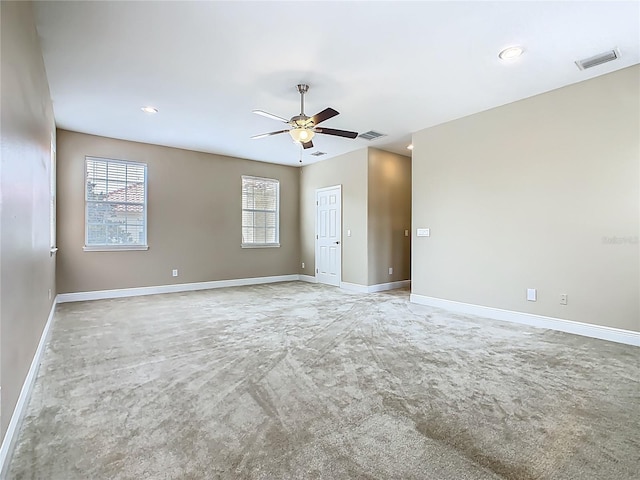 2209 Callaway Ct, Davenport, FL 33837 - empty room with light colored carpet, ceiling fan, and recessed lighting