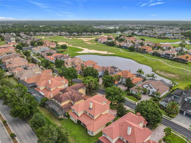 2209 Callaway Ct, Davenport, FL 33837 - aerial perspective of suburban area featuring a golf club and a nearby body of water