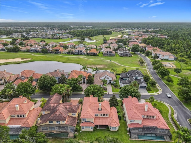 2209 Callaway Ct, Davenport, FL 33837 - aerial view of residential area featuring a local golf course and a nearby body of water