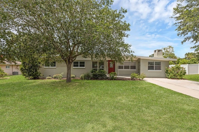 203 E Lakeview Ave, Eustis, FL 32726 - view of front of house with brick siding and concrete driveway