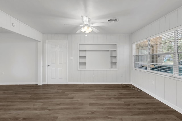 203 E Lakeview Ave, Eustis, FL 32726 - spare room featuring ceiling fan, built in features, and wood finished floors