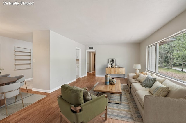 518 NW 36th Ter, Gainesville, FL 32607 - living room with wood finished floors and baseboards