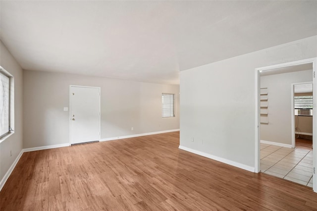 518 NW 36th Ter, Gainesville, FL 32607 - unfurnished room with plenty of natural light, light wood-type flooring, and cooling unit