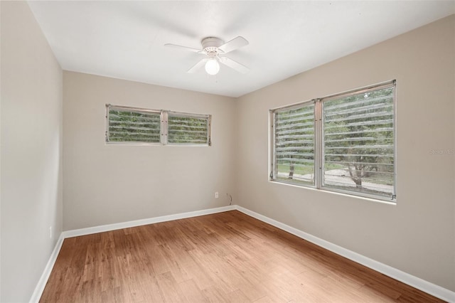 518 NW 36th Ter, Gainesville, FL 32607 - unfurnished room featuring a ceiling fan and light wood finished floors