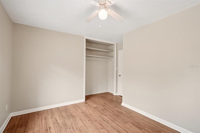 518 NW 36th Ter, Gainesville, FL 32607 - unfurnished bedroom with light wood-style flooring, a closet, and ceiling fan