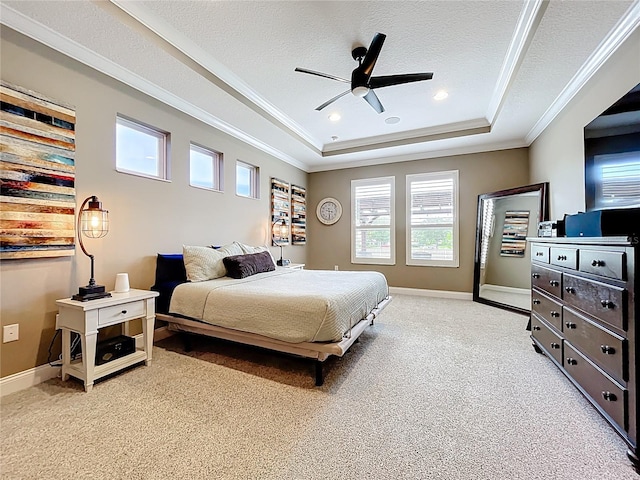 31980 Geoff Way, Sorrento, FL 32776 - bedroom featuring a raised ceiling, light carpet, ornamental molding, ceiling fan, and a textured ceiling