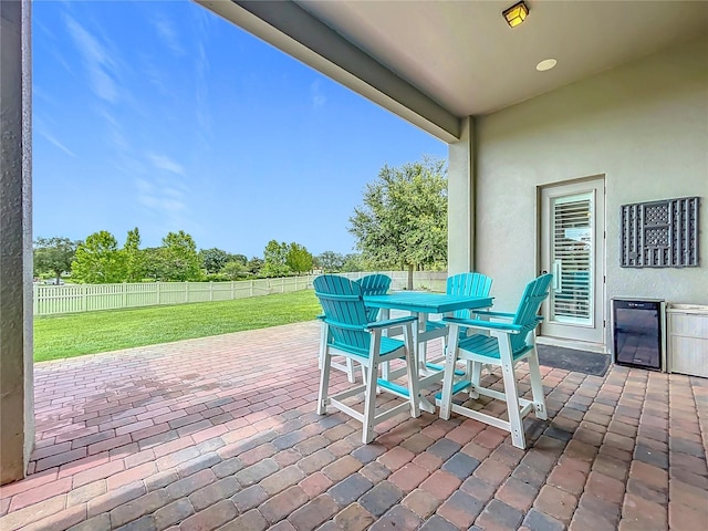 31980 Geoff Way, Sorrento, FL 32776 - fenced backyard featuring a patio area and outdoor dining area