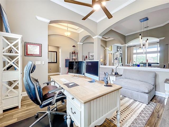 31980 Geoff Way, Sorrento, FL 32776 - office featuring ornamental molding, ceiling fan, arched walkways, wood finished floors, and ornate columns
