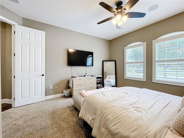 31980 Geoff Way, Sorrento, FL 32776 - bedroom featuring a ceiling fan and carpet