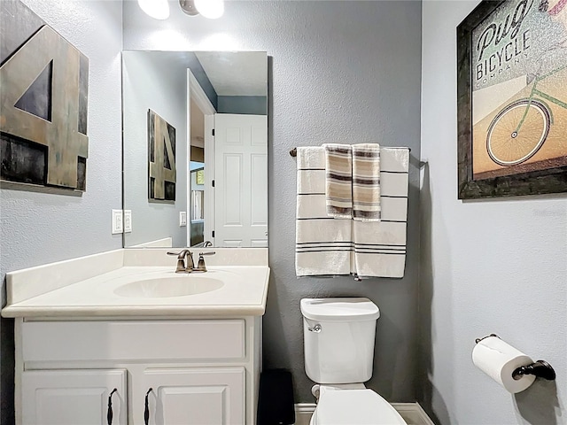 31980 Geoff Way, Sorrento, FL 32776 - bathroom featuring vanity and a textured wall