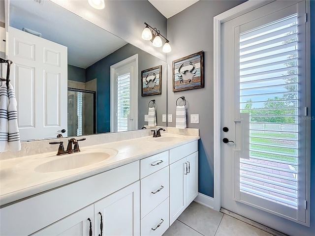 31980 Geoff Way, Sorrento, FL 32776 - full bathroom with tile patterned floors, double vanity, and a shower stall