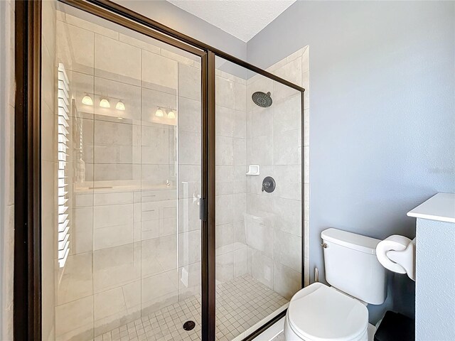 31980 Geoff Way, Sorrento, FL 32776 - bathroom featuring toilet and a shower stall