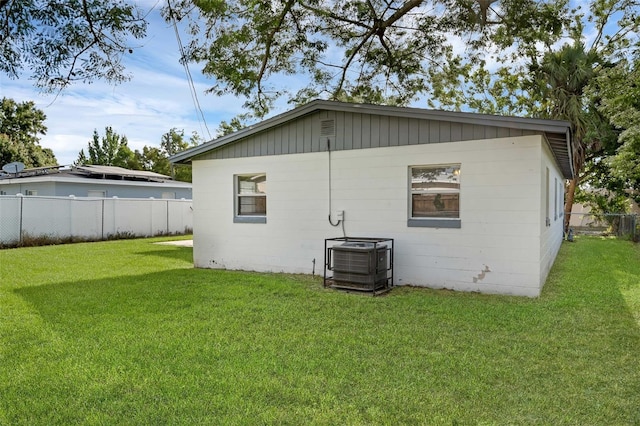 7612 Pomelo Dr, Orlando, FL 32819 - view of property exterior with a central AC unit