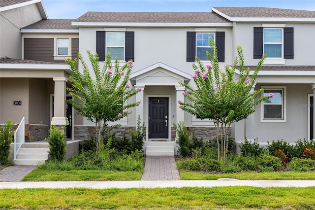 3099 Ella Way, Saint Cloud, FL 34771 - view of property featuring stucco siding and stone siding