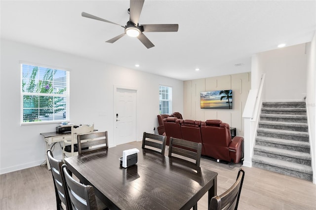 3099 Ella Way, Saint Cloud, FL 34771 - dining space featuring stairway, light wood-type flooring, a ceiling fan, and recessed lighting
