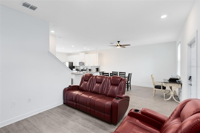 3099 Ella Way, Saint Cloud, FL 34771 - living area with ceiling fan, light wood-style floors, and recessed lighting