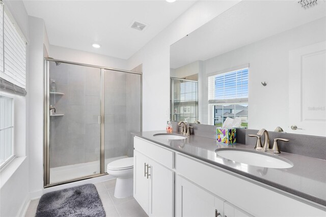 3099 Ella Way, Saint Cloud, FL 34771 - full bath featuring double vanity, a stall shower, tile patterned flooring, and recessed lighting
