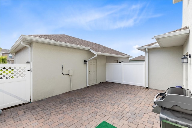 3099 Ella Way, Saint Cloud, FL 34771 - view of patio / terrace with a grill and a gate