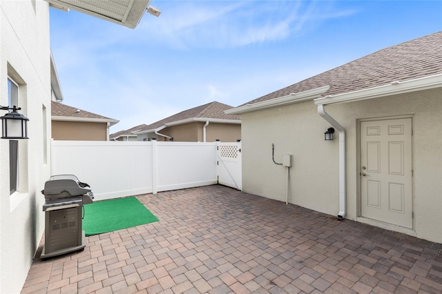 3099 Ella Way, Saint Cloud, FL 34771 - view of patio / terrace featuring area for grilling and a gate