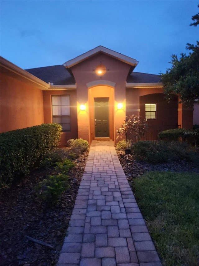 152 Glendale Ct, Kissimmee, FL 34759 - property entrance with stucco siding