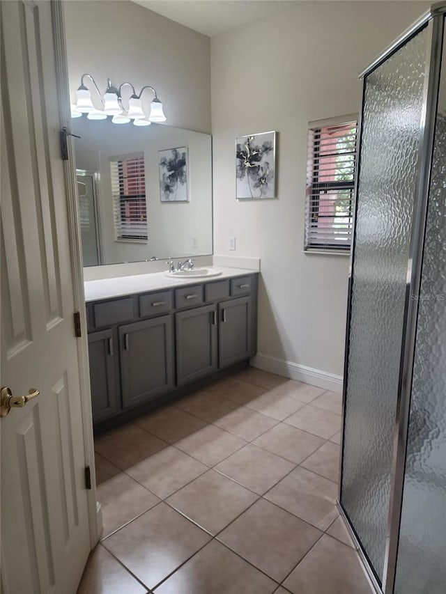 152 Glendale Ct, Kissimmee, FL 34759 - bathroom with vanity, a stall shower, and tile patterned floors
