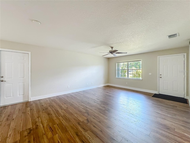 117 Burns Ave, Longwood, FL 32750 - spare room with ceiling fan, wood finished floors, and a textured ceiling