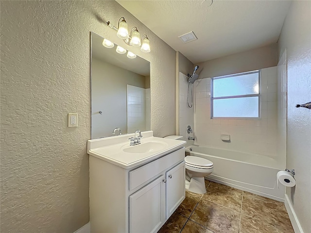 117 Burns Ave, Longwood, FL 32750 - full bathroom featuring a textured wall, vanity, shower / bath combination, and a textured ceiling
