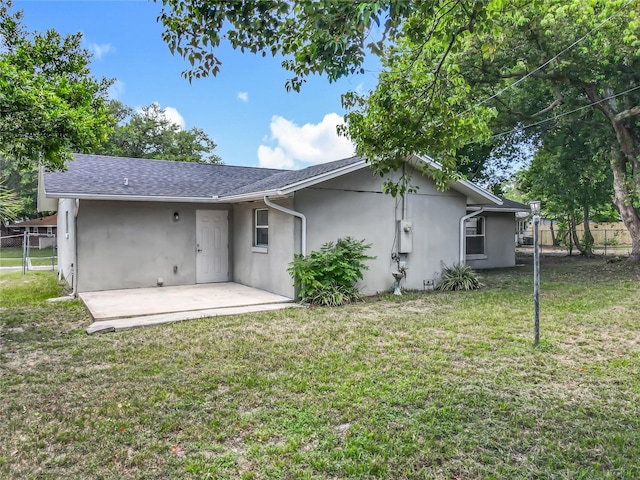 117 Burns Ave, Longwood, FL 32750 - rear view of property featuring stucco siding and a patio