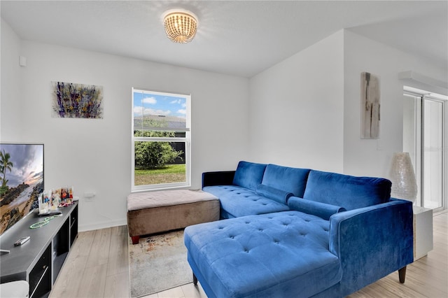 205 Cimarron Dr, Kissimmee, FL 34759 - living room with light wood-type flooring and baseboards