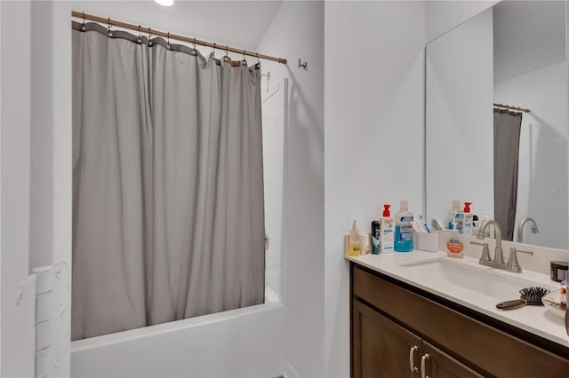 205 Cimarron Dr, Kissimmee, FL 34759 - full bathroom featuring vanity and shower / tub combo