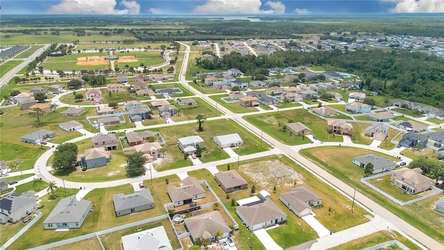 205 Cimarron Dr, Kissimmee, FL 34759 - aerial overview of property's location featuring nearby suburban area