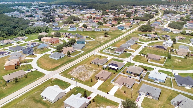 205 Cimarron Dr, Kissimmee, FL 34759 - aerial overview of property's location featuring nearby suburban area