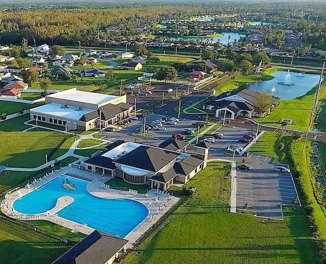 205 Cimarron Dr, Kissimmee, FL 34759 - aerial view of a pool and a nearby body of water