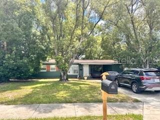 view of front of home with a front lawn