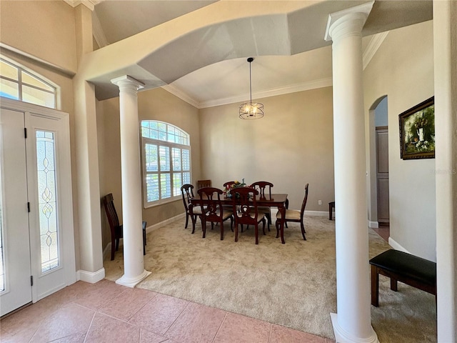 800 Sterling Chase Dr, Port Orange, FL 32128 - dining area with carpet floors, ornate columns, ornamental molding, arched walkways, and tile patterned floors