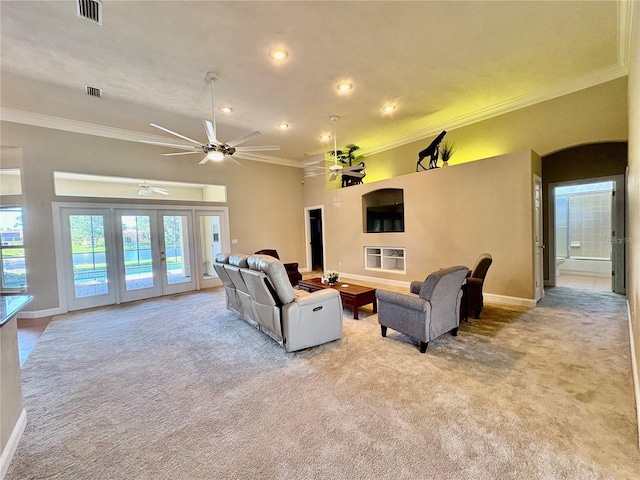 800 Sterling Chase Dr, Port Orange, FL 32128 - living area with carpet floors, crown molding, french doors, ceiling fan, and recessed lighting