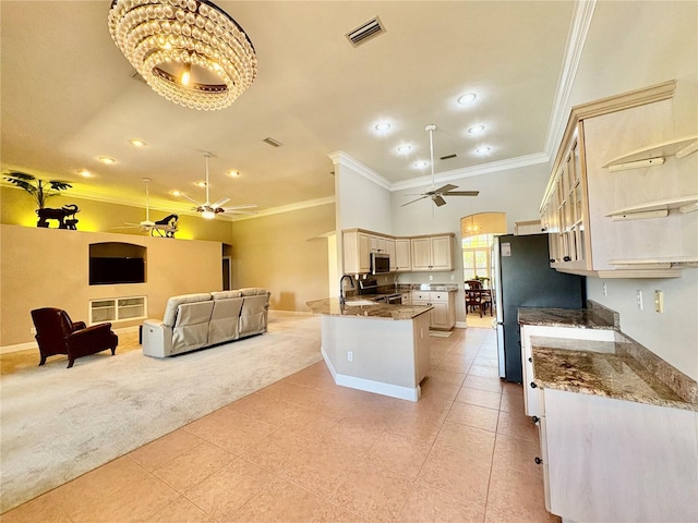 800 Sterling Chase Dr, Port Orange, FL 32128 - kitchen featuring ceiling fan, light carpet, open floor plan, appliances with stainless steel finishes, and crown molding