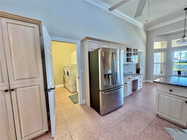 800 Sterling Chase Dr, Port Orange, FL 32128 - kitchen featuring stainless steel refrigerator with ice dispenser, separate washer and dryer, light tile patterned floors, crown molding, and a ceiling fan