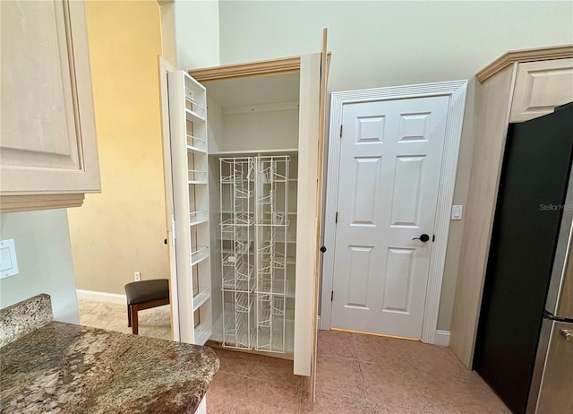 800 Sterling Chase Dr, Port Orange, FL 32128 - bathroom with tile patterned floors and baseboards
