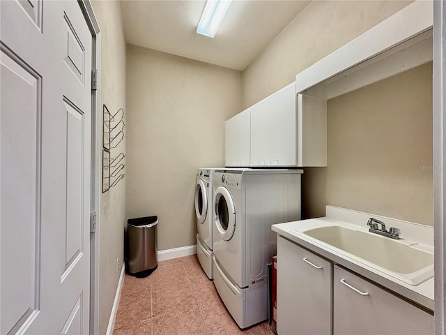 800 Sterling Chase Dr, Port Orange, FL 32128 - laundry room with independent washer and dryer, cabinet space, and light tile patterned flooring