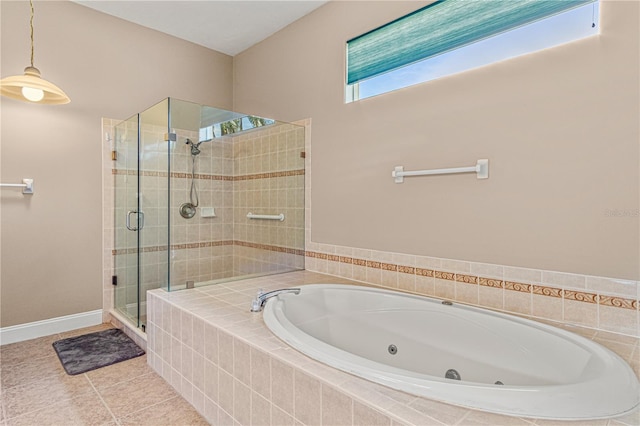 800 Sterling Chase Dr, Port Orange, FL 32128 - bathroom with a whirlpool tub, a stall shower, and tile patterned floors