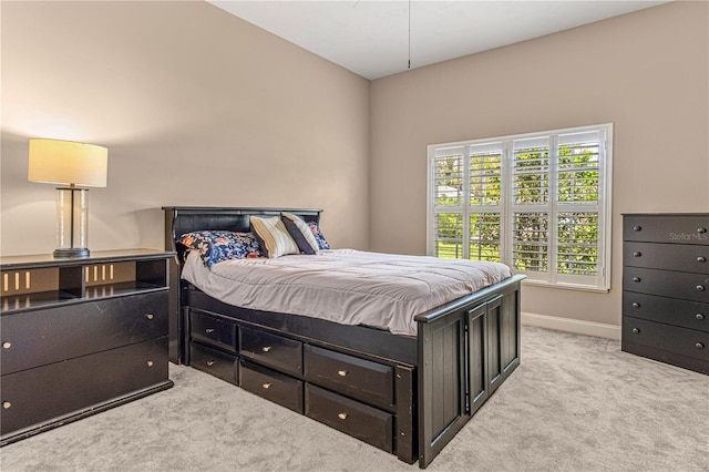 800 Sterling Chase Dr, Port Orange, FL 32128 - bedroom featuring light carpet and baseboards