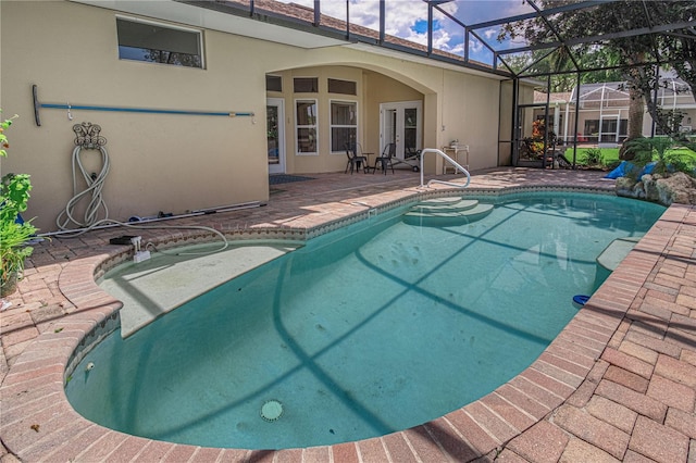 800 Sterling Chase Dr, Port Orange, FL 32128 - swimming pool with a patio area and glass enclosure