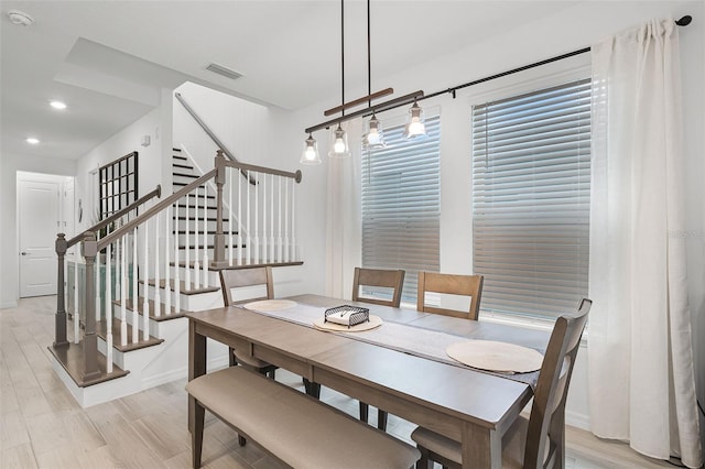 15133 Summer Harvest St, Winter Garden, FL 34787 - dining space with recessed lighting, light wood-style flooring, and stairway