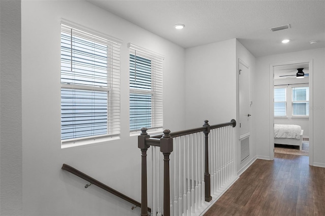 15133 Summer Harvest St, Winter Garden, FL 34787 - hall with an upstairs landing, wood finished floors, recessed lighting, and a textured ceiling