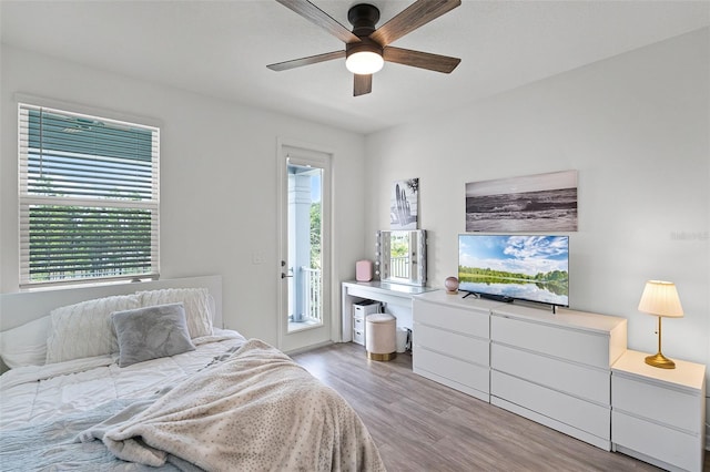 15133 Summer Harvest St, Winter Garden, FL 34787 - bedroom featuring wood finished floors, access to exterior, and ceiling fan