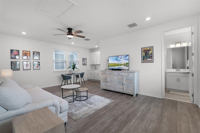 15133 Summer Harvest St, Winter Garden, FL 34787 - living room featuring wood finished floors, ceiling fan, and recessed lighting