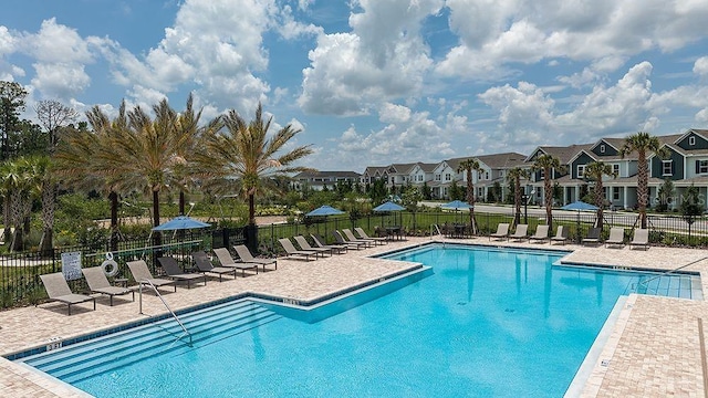 15133 Summer Harvest St, Winter Garden, FL 34787 - community pool with a patio and a residential view