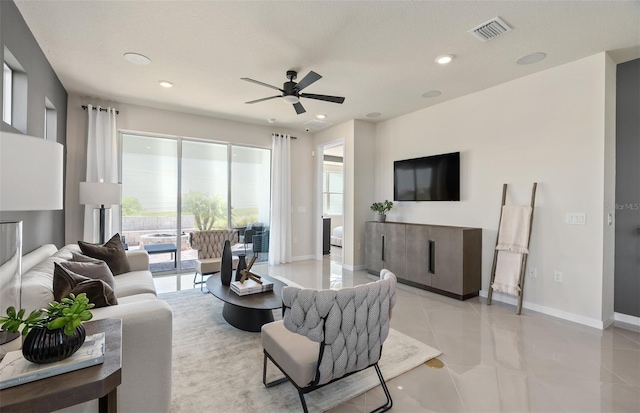 13533 Pearl Beach St, Winter Garden, FL 34787 - living room with ceiling fan, light tile patterned floors, and recessed lighting
